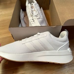 Women’s size 8.5 adidas. Never worn, tags and box.
